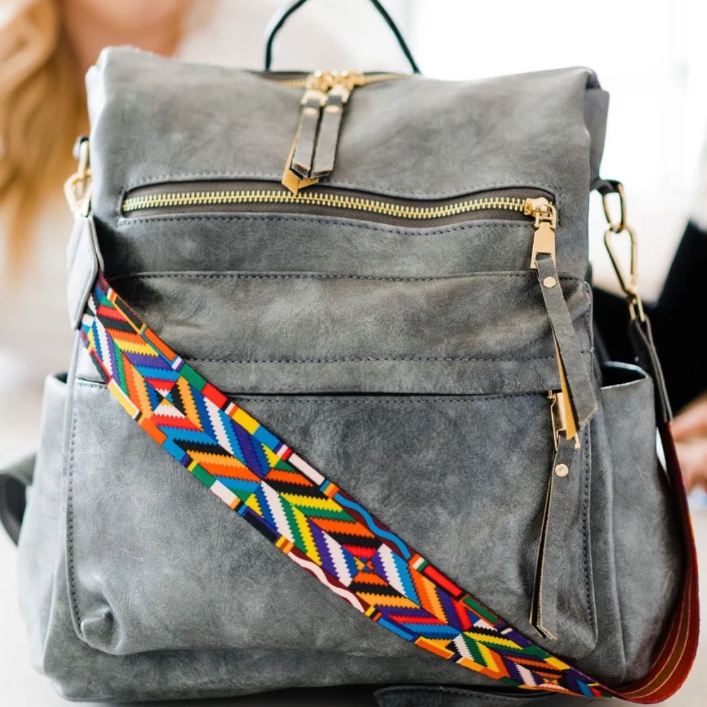 Gray Leather Backpack with Colorful Strap